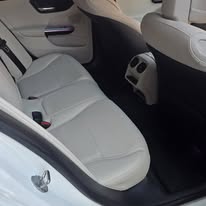 White Mercedes, back seat
